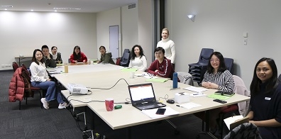 Nine Moonah Bazaar Project participants with Business Advisor and Mentor, Anita Dahlenburg (standing) at CatholicCare, New Town for their first session.